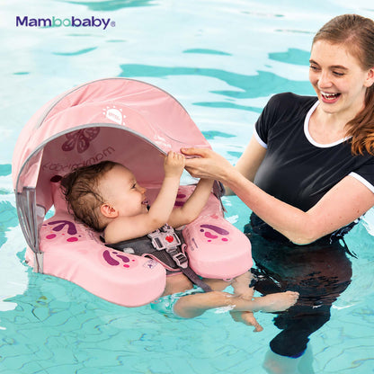 Mother and baby playing with Kiddiko Mambobaby pink baby float in the pool