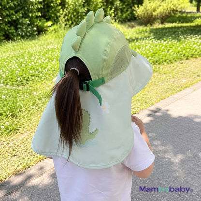 Child wearing Mambobaby Dino sun hat showing 360° neck coverage outdoors