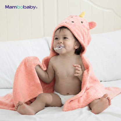 Baby wrapped in Mambobaby hooded towel, hood up, Unicorn Pink