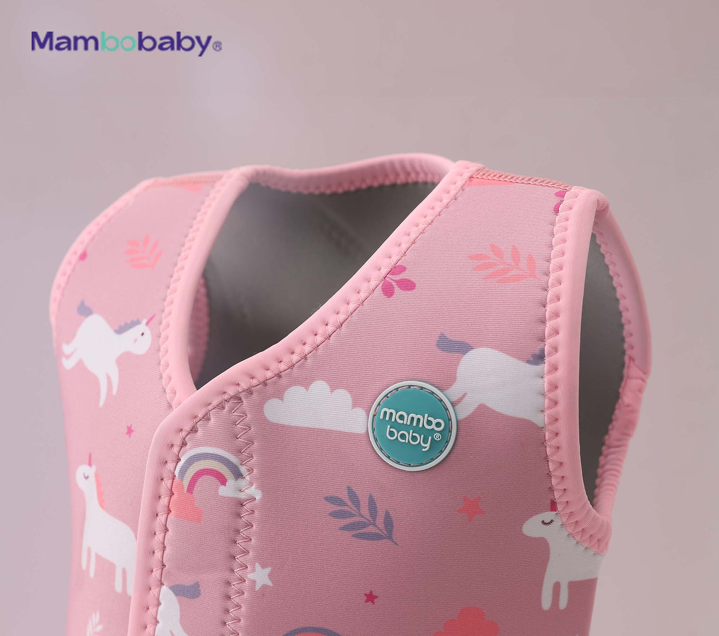 Close-up of Mambobaby logo badge on thermal wetsuit shoulder