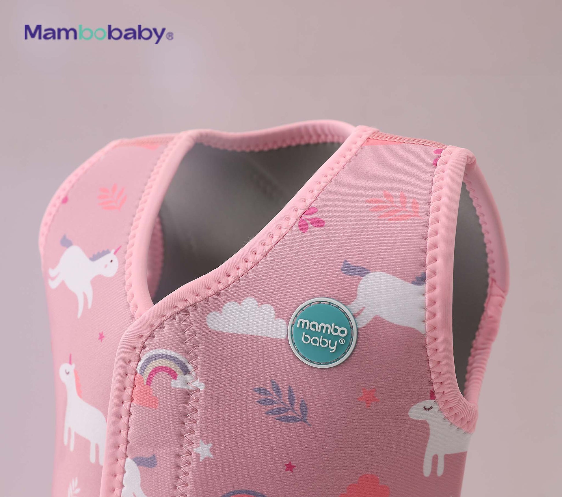 Close-up of Mambobaby logo badge on thermal wetsuit shoulder