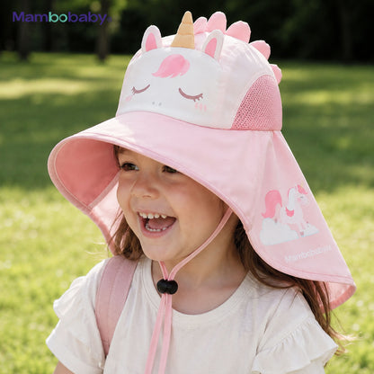Child wearing the Mambobaby Unicorn sun hat outdoors in pink