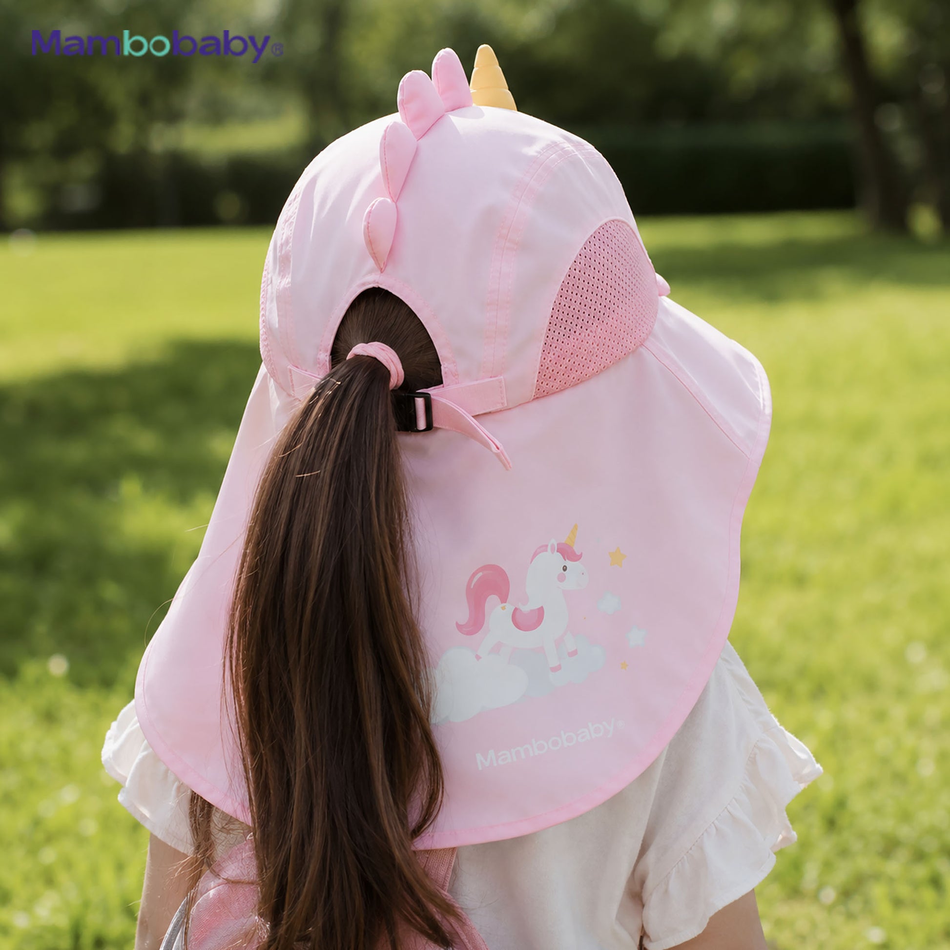 Child wearing Mambobaby Unicorn sun hat showing 360° neck coverage outdoors